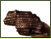 Ein grosses Kiefern-Holzkohlestck, es stammt von einem Stamm oder dickem Ast, leichte Jahrringkrmmung