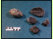 Olivensteine und Fragmente, verkohlt erhalten geblieben